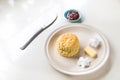 Simple English scones set with butter, cream and strawberry jam