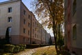 A simple European courtyard in the autumn period. Golden autumn in a residential area Royalty Free Stock Photo