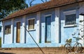 Simple farm house. Brick house, red roof, red earth farm, Brazil.