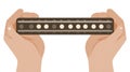 Hands Holding Harmonica Instrument - Blues Music Concept Royalty Free Stock Photo
