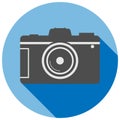 Simple flat round dslr camera icon or symbol Royalty Free Stock Photo