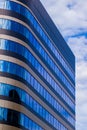 Simple generic building of a modern architecture with glass windows, Corporate building