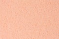 Simple gently light orange, creamy, pink ethylene vinyl acetate foam, foamiran texture. High resolution photo texture of Royalty Free Stock Photo