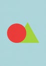 A simple geometric composition features a red circle overlapping a green triangle Royalty Free Stock Photo