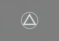 A simple geometric logo on a gray background. It consists of a white equilateral triangle Royalty Free Stock Photo