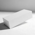 A simple geometric white rectangular block on a plain surface under soft lighting Royalty Free Stock Photo