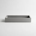 Rectangular box with sharp edges and a minimalistic design placed against a Royalty Free Stock Photo