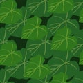 Simple green leaves seamless pattern on black background. Foliage wallpaper in flat style Royalty Free Stock Photo