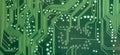 Simple green PCB, circuit board lines, paths abstract background texture, backdrop, nobody, wide shot, object detail, closeup Royalty Free Stock Photo