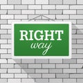 Simple green sign with text `Right Way` hanging on a gray brick wall Grunge brickwork background, textured rough surface