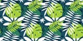 Simple green tropical leaves design seamless pattern