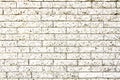 White stone wall: simple grungy white brick stone wall as seamless pattern texture background Royalty Free Stock Photo