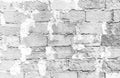 Simple grungy white brick wall surface with excess cement uniting large concrete block bricks seamless pattern texture background