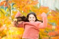 Simple happiness. Kid enjoy autumn outdoors. Meet autumn. Little girl smiling happy cute child gorgeous long hair maple