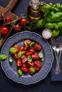 Simple and healthy dish, tomato and basil Royalty Free Stock Photo