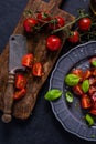 Simple and healthy dish, tomato and basil Royalty Free Stock Photo