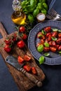 Simple and healthy dish, tomato and basil Royalty Free Stock Photo