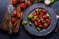 Simple and healthy dish, tomato and basil Royalty Free Stock Photo