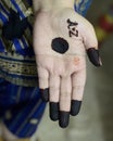 Simple Henna Tatoo on Hand with Alphabets.
