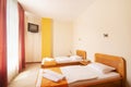 Simple hotel room with two beds Royalty Free Stock Photo