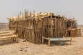 Simple hut in Hamed Ela, Afar tribe settlement in the Danakil depression, Ethiopi Royalty Free Stock Photo