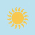 A simple illustration of a sun on a light blue background. The sun consists of a central Royalty Free Stock Photo