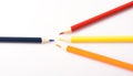 A simple image. Four colored pencils on a White background.