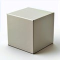 A simple image of a white cube sitting on a white surface lit with soft light and visible shadows Royalty Free Stock Photo