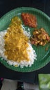 A simple Indian food rice, chatni and vegetable curry