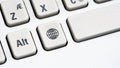 Simple internet access symbol key on a computer keyboard, earth, globe network icon button macro, detail, extreme closeup Royalty Free Stock Photo