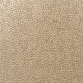 A plain background featuring a leather texture in an elegant ivory color