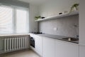 Simple kitchen with vintage heater