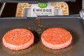 Simple Life Emerge plant based burger in grilling on grill plate