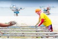 Simple life, Thai woman laying down fish on the net for drying, harbor and traditional fishing boat backgrounds. Rainy season.