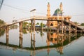 Simple life. View canal side of Muslim village at sunset time, a