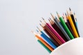 Simple light background with a set of colored pencils Royalty Free Stock Photo