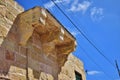 Simple limestone balcony support brackets, saljaturi