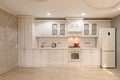 Luxury modern white and beige kitchen interior Royalty Free Stock Photo