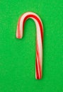 Mini Candy Cane on a Green Background