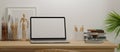 Simple minimal wooden workspace with laptop computer and accessories Royalty Free Stock Photo