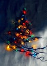 Minimalistic Christmas Tree Design Using Tangled String Lights on Dark Background