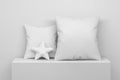 Simple mockup template with two white blank pillows and star
