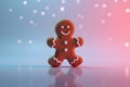 Modern Gingerbread man cookie in pink and blue light reflection on glossy surface. Minimal festive background for Christmas Royalty Free Stock Photo