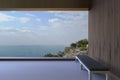 Simple modern rooms and wooden walls and a Chair in the corner window view, the high mountains and the clear blue sky