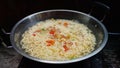 Simple noodle soup with the addition of tomatoes and cabbage. Typical noodles from Indonesia. Selective focus.