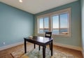 Simple office room in light blue color