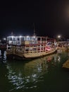 simple passenger ship anchored at night Royalty Free Stock Photo