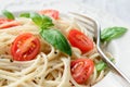 Simple pasta meal with tomatoes and greens Royalty Free Stock Photo