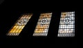 Simple patterned antique stained glass window silhouettes frame on black background in The national gallery Royalty Free Stock Photo