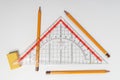 Simple pencils, eraser and ruler triangle Royalty Free Stock Photo